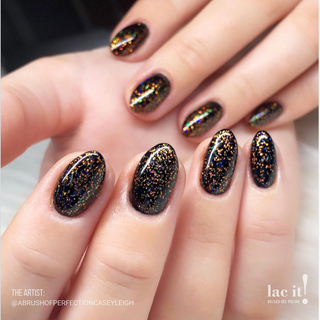 en Vogue Lac It! Orion jelly orange base with fine orange and holographic microglitters UV/LED gel nail polish for professional nails and extensions on short almond shaped manicured nails